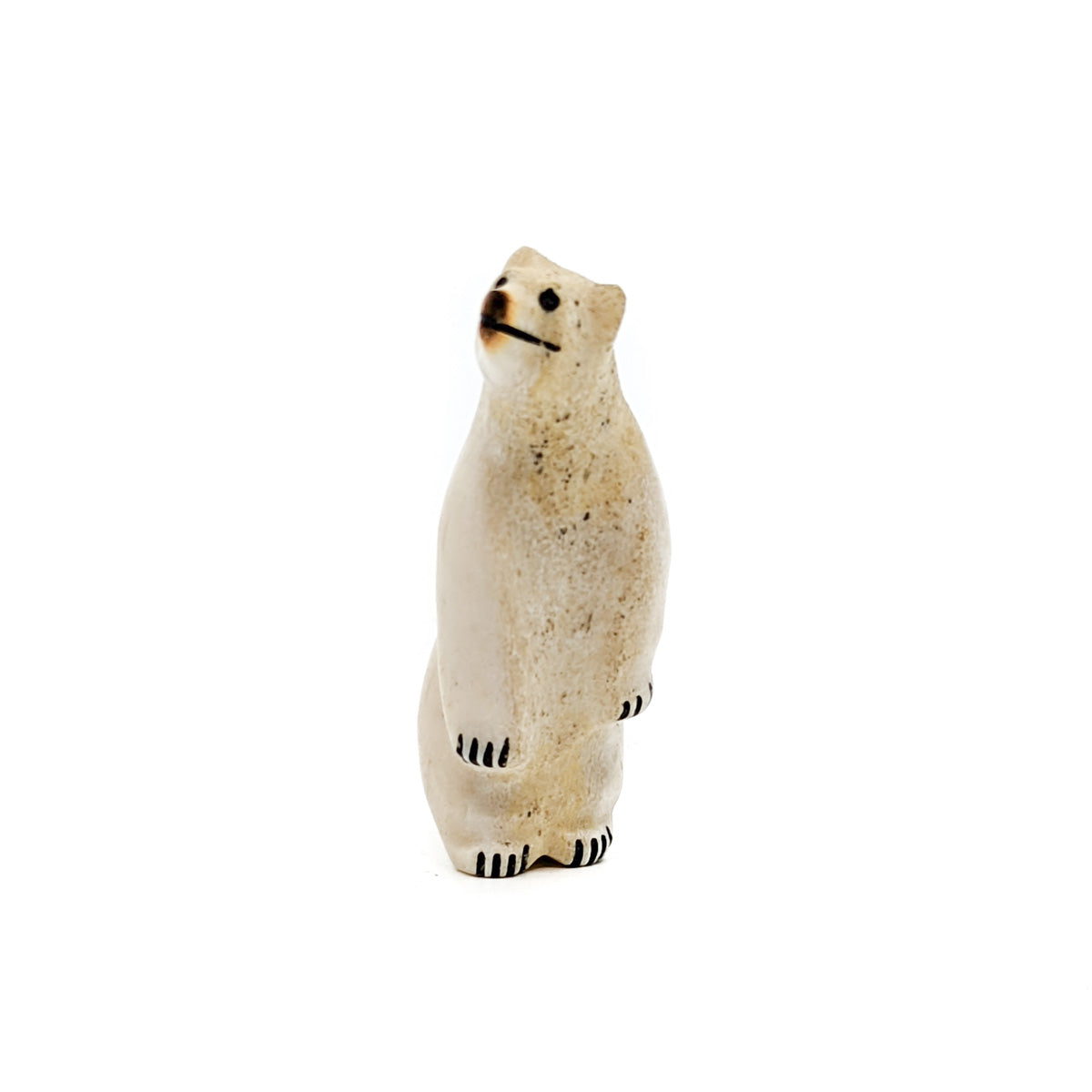 Wonderful White Bear carving, made from shed antler Hand carved by Zuni artist, Raymond "Ramie" Haloo, circa 1985 Bears are associated with healing, the white bear being the most powerful. White bear is also the directional guardian for the West Measures approximately 2 inches high by .5 inches wide&nbsp;