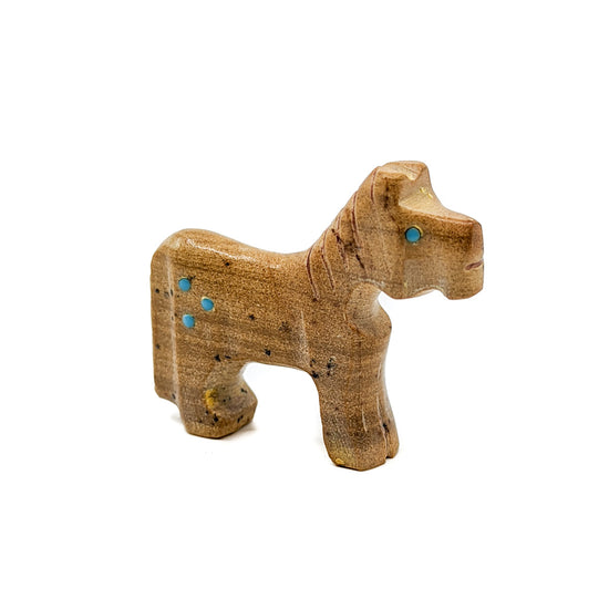 Carved from Sandstone with Turquoise eyes and accents&nbsp;  Horses are associated with partnership and strength  Measures approximately 1.5 inches long x&nbsp; .25 inches wide x 1.25 inches high