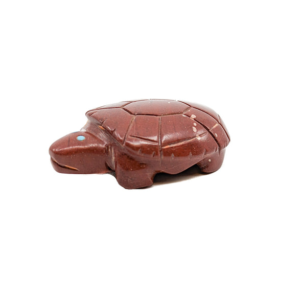 Pipestone Turtle with Turquoise eyes The Turtle is associated with longevity and self-reliance  Measures approximately 2 inches long x 1.25 inches wide x .5 inches high