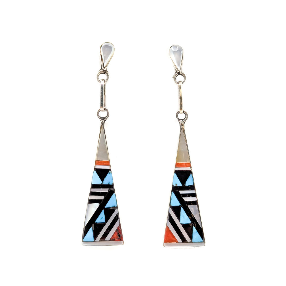 Tapered Mosaic Inlay&nbsp; Earrings by Robert Naktewa, Zuni
Materials may include Jet, Turquoise Red Coral, and Mother of Pearl
Selection of patterns and materials may vary slightly, please allow us to choose a pair for you
Measures approximately 1.5 inches long, tapers to .50 inches wide, dangles from earlobe approximately 2.25 inches
Sterling Silver posts and backs