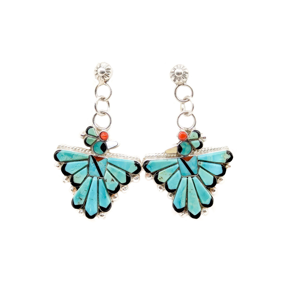 Hand crafted channel inlay Thunderbird Earrings by Michelle Peina
Materials include turquoise, jet and mother of pearl
Each earring measures approximately 1 inch long by 1 inch wide, and dangles from earlobe approximately 1.5 inches&nbsp;
Sterling silver posts and backs